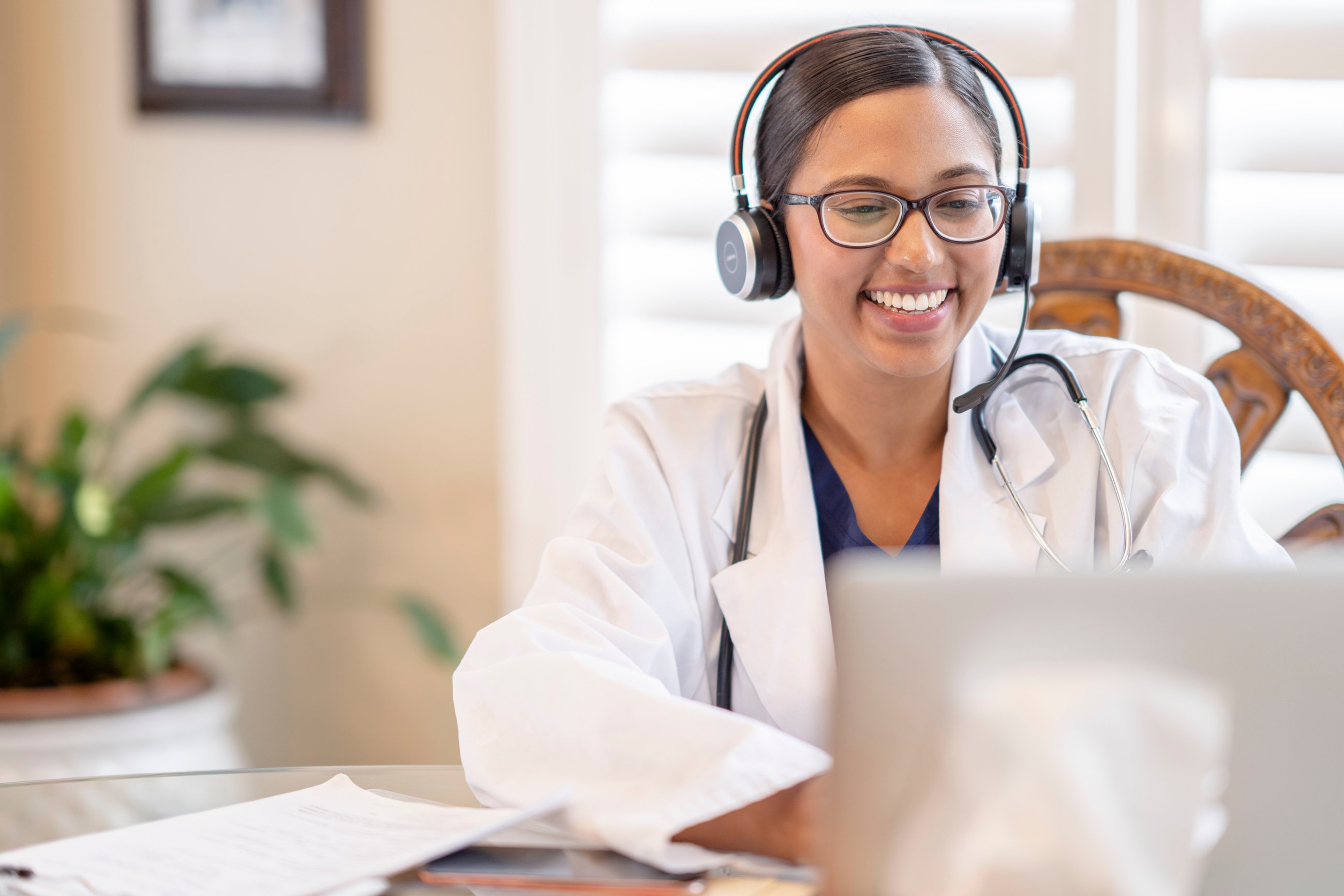 Female doctor doing a telemedicine video call