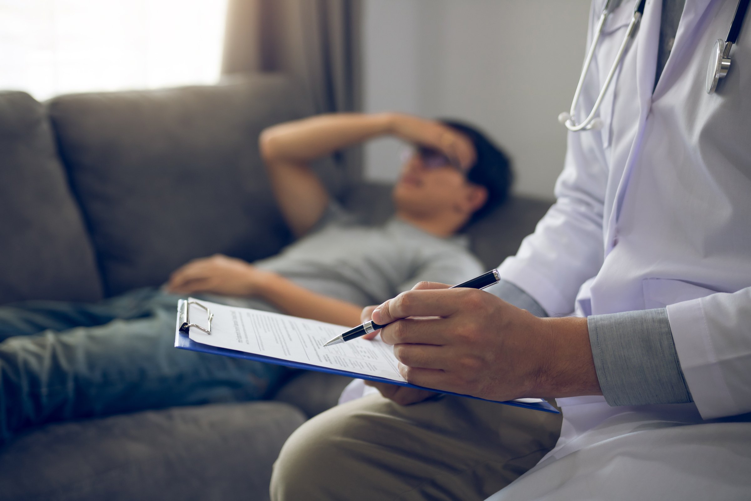 Doctor Visiting Patient at Home